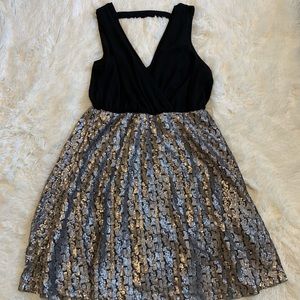 V-Neck black with metallic dress.